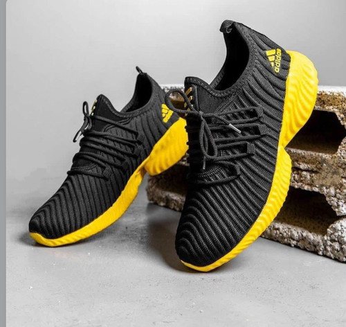 خرید کفش کتونی زنانه و مردانه آدیداس مدل آلفا مشکی زرد